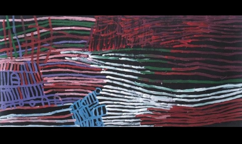 Large Minnie Pwerle painting of long white, green, magenta, red and blue lines flowing horizontally across a black background, with smaller striped forms at the left.