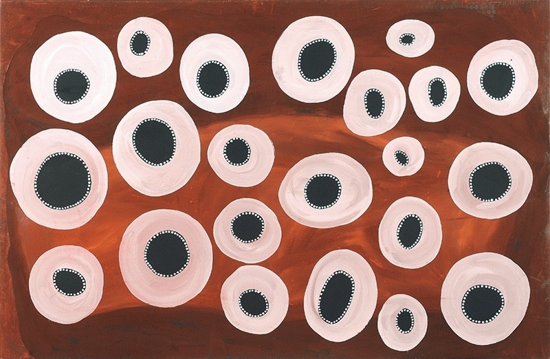Jack Dale Mengenen painting of twenty irregular Wandjina stones, each formed from a pale pink oval surrounding a dark centre edged with fine white dots, scattered across an earthy red-brown ground.