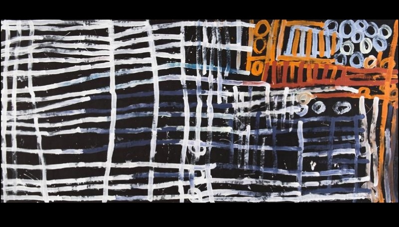 Large Minnie Pwerle painting of broad white and pale blue lines forming open grids across a black background, with orange striped and circular forms concentrated at the upper right.