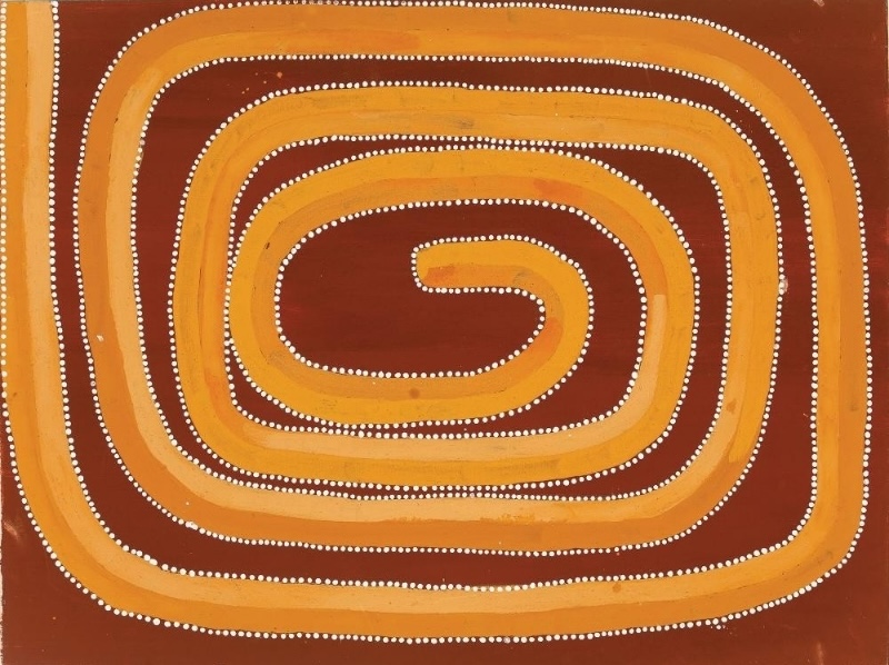 Rover Thomas painting in rich red-brown and golden yellow ochres. A broad golden band curls inward in a large rectangular spiral across the canvas, separated from the dark red-brown ground by continuous rows of small white dots. The spiral tightens towards the centre and the entire composition is framed by dotted lines.