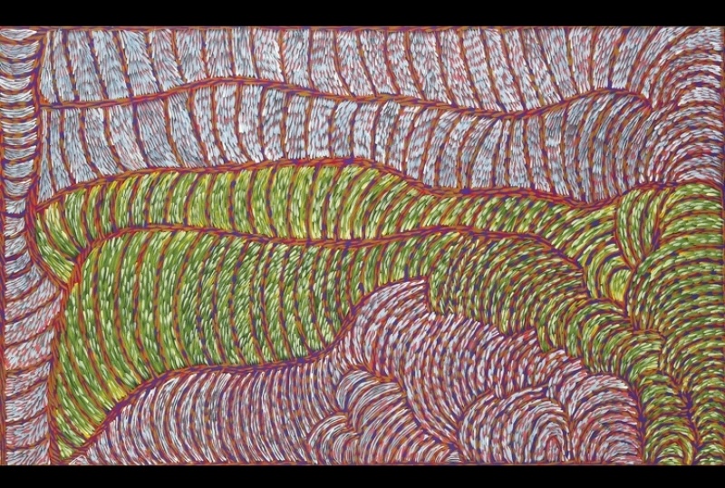 Painting by Gloria Petyarre with broad interlocking fields of green, white, red and blue short brushstrokes flowing in curved bands across the canvas.