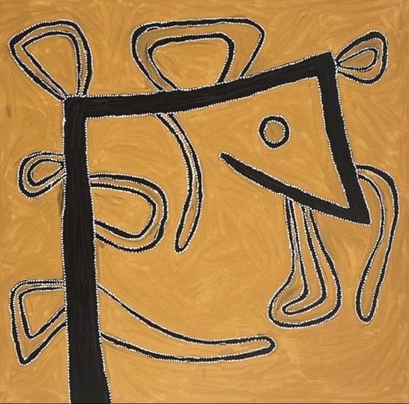 Rover Thomas painting in golden yellow, black and white. Thick black angular lines form a large irregular structure across the centre, surrounded by numerous looping and curved shapes outlined in black and fine white dots. The interlocking forms appear to twist and circulate across the golden ochre ground.