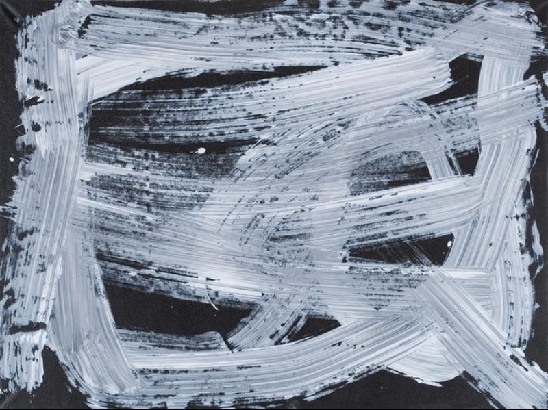 Black-and-white painting by Gloria Petyarre with broad sweeping white and grey brush marks crossing, overlapping and curving across a black ground.