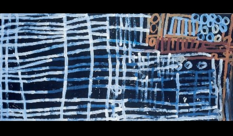 Large Minnie Pwerle painting of broad white and pale blue lines crossing a dark blue-black ground, with smaller ochre, brown and blue striped and circular forms concentrated at the upper right