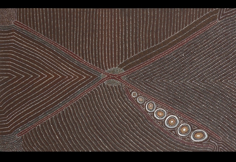 Kathleen Petyarre’s Mountain Devil, 1995, with crossing red lines, concentric circles and precisely ordered fields of fine white dots.