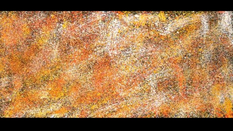 Long horizontal painting by Gloria Petyarre covered with dense, softly blended fields of tiny white, yellow, orange, red and brown marks.
