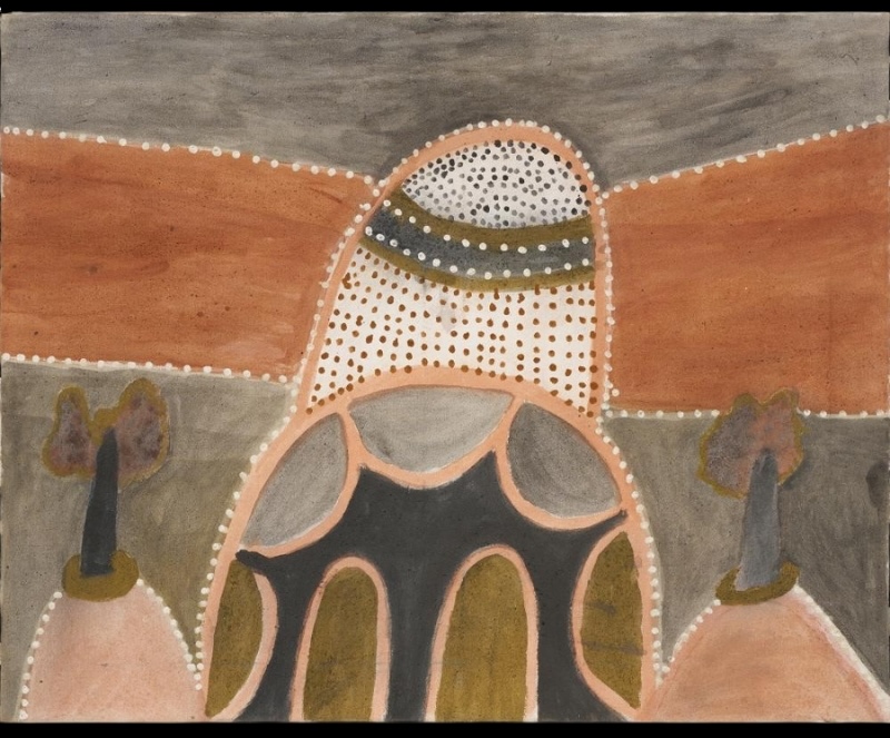 Hector Jandany Aboriginal ochre painting showing a large central rounded form filled with dots and geometric shapes, flanked by two trees and layered hills in pink, grey and red earth colours.