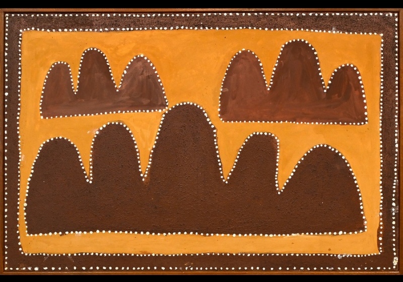 Queenie McKenzie ochre landscape showing three dark brown groups of rounded hills outlined with white dots against a golden yellow ground.