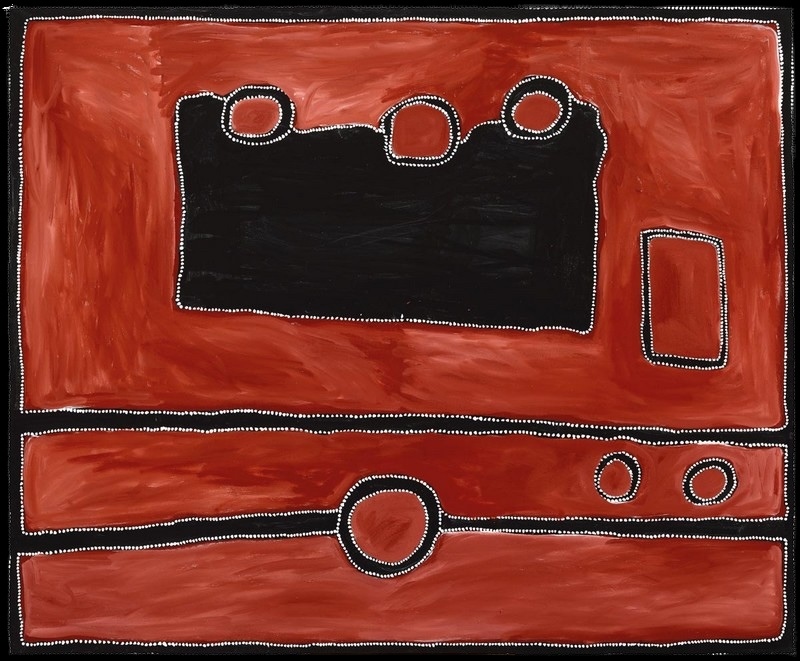 Rammey Ramsey painting on a broadly brushed red-ochre ground with a large irregular black form across the upper centre. Three rounded red forms sit along its upper edge, with a smaller rectangle to the right and horizontal bands and circles below, all outlined with small white dots.