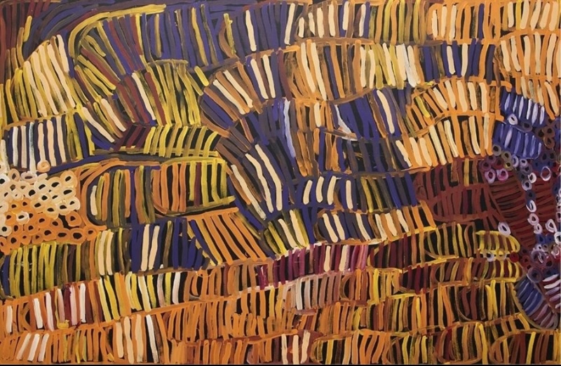 Minnie Pwerle painting densely filled with overlapping striped forms in ochre, yellow, orange, purple, cream and burgundy, with clusters of small circular marks at the sides.