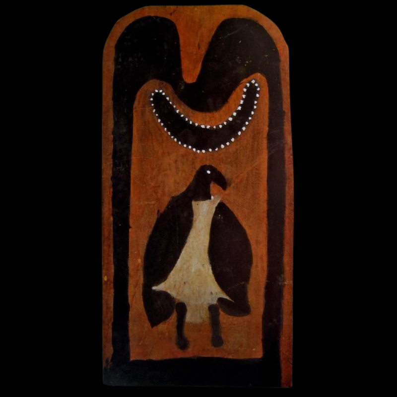 Hector Jandany Aboriginal ochre painting on a tall plywood board, depicting a black, white and brown bird-like ancestral figure beneath a curved dotted form.