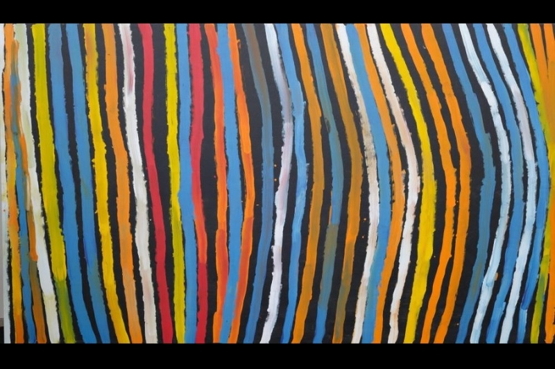 Minnie Pwerle painting of long vertical bands in blue, orange, yellow, white, red and grey flowing across a black ground, with the parallel lines gently bending and changing direction.