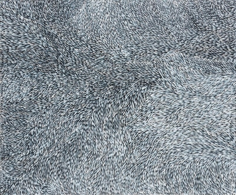 Large black-and-white painting by Gloria Petyarre filled with thousands of fine leaf-like strokes flowing in dense swirling currents across the canvas.