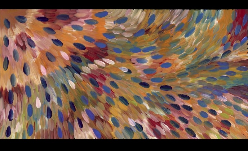 Gloria Petyarre painting of large multicoloured leaf-shaped brushstrokes sweeping across the canvas in broad flowing currents.