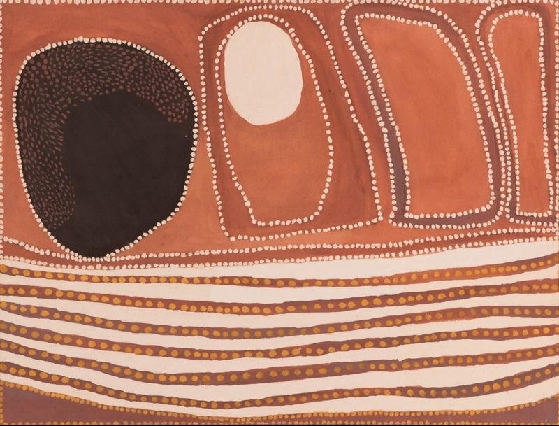 Rover Thomas painting in salmon pink, brown, black and white ochre. A large rounded black cave-like form fills the upper left, beside a smaller outlined shape containing a prominent white oval. Three tall narrow forms stand to the right. Across the lower third, five broad wavy white bands alternate with reddish-brown lines dotted in orange.