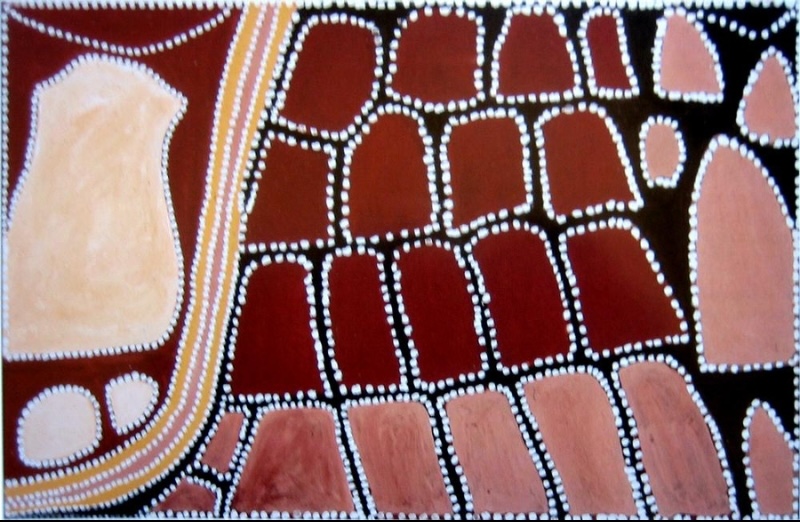 Queenie McKenzie ochre landscape with rows of red, pink and brown hill forms outlined in white dots beside curving yellow tracks.