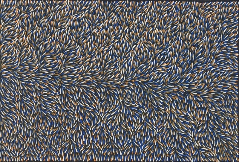 Gloria Petyarre painting of dense blue, white and ochre leaf-shaped brushstrokes flowing in rhythmic swirling patterns across a dark ground.