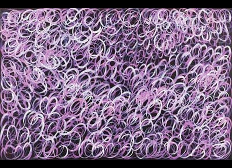 Gloria Petyarre painting covered with overlapping loops of pale pink, lavender, purple and white against a dark ground.