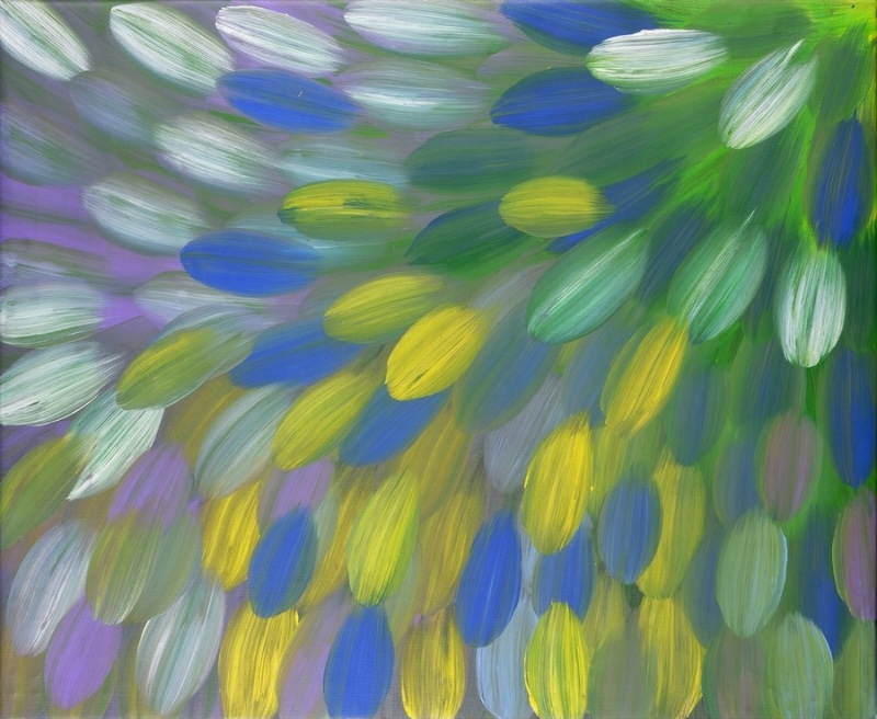 Gloria Petyarre painting of large blue, yellow, green, purple and white bush medicine leaves sweeping across the canvas.