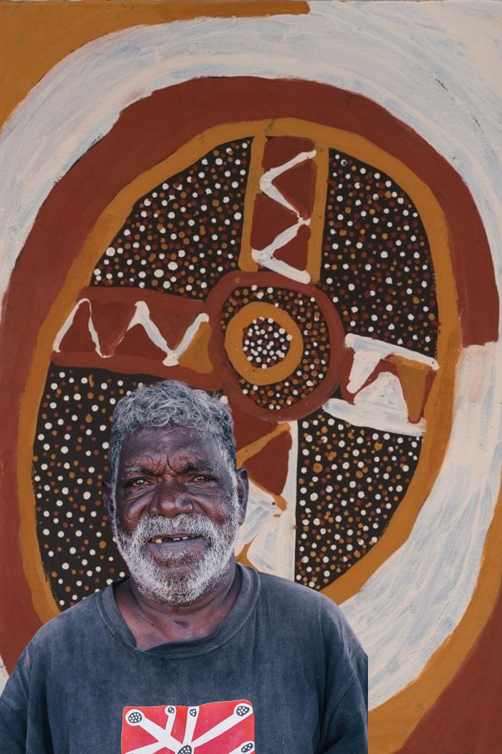 Timothy Cook in front of one of his ochre Kulama paintings