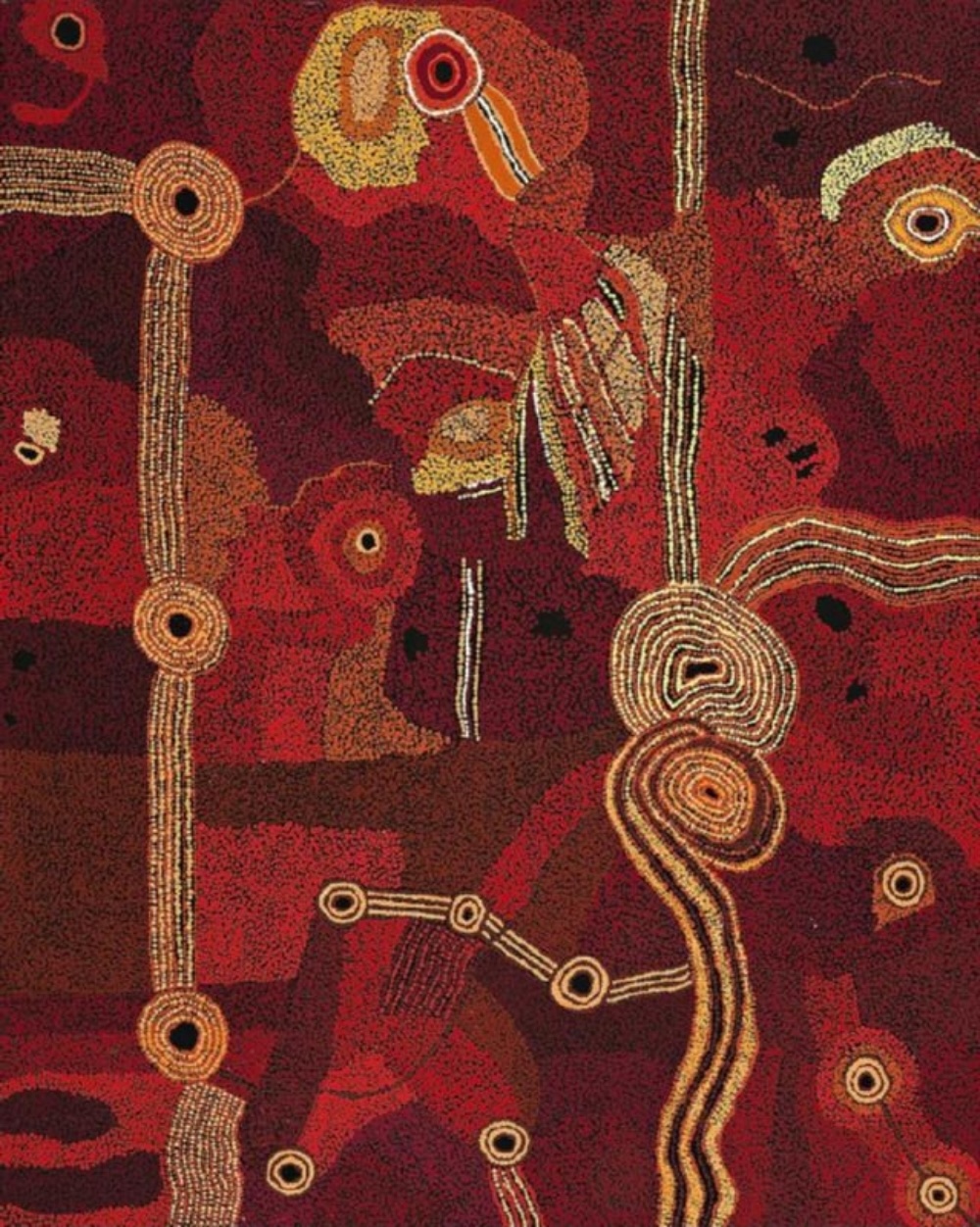 Tjungkara Ken’s Tjala Tjukurpa (Honey Ant Story), 2008, with circular forms and connecting lines across densely dotted red and ochre fields.