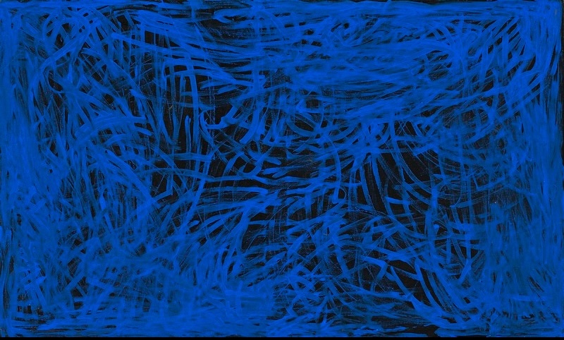 Emily Kame Kngwarreye’s Yam Awelye, 1996, with vivid blue lines sweeping, looping and intersecting across a deep black and blue ground.