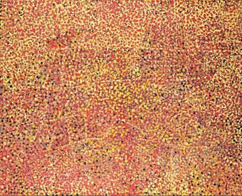 Emily Kame Kngwarreye’s Alalgura Awelye, 1991, densely covered with red, yellow, pink, white and black dots over faint meandering linear forms.