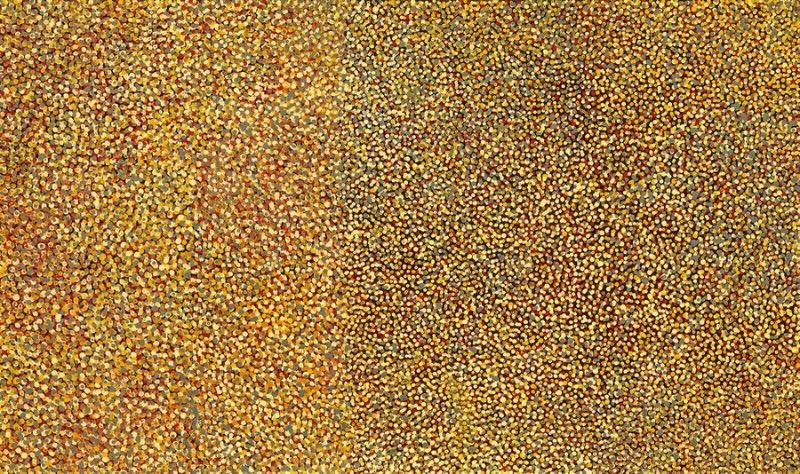 Emily Kame Kngwarreye’s Kame Flowers, 1991, densely covered with thousands of small yellow, ochre, orange, cream and muted green dots forming an almost continuous field of colour.