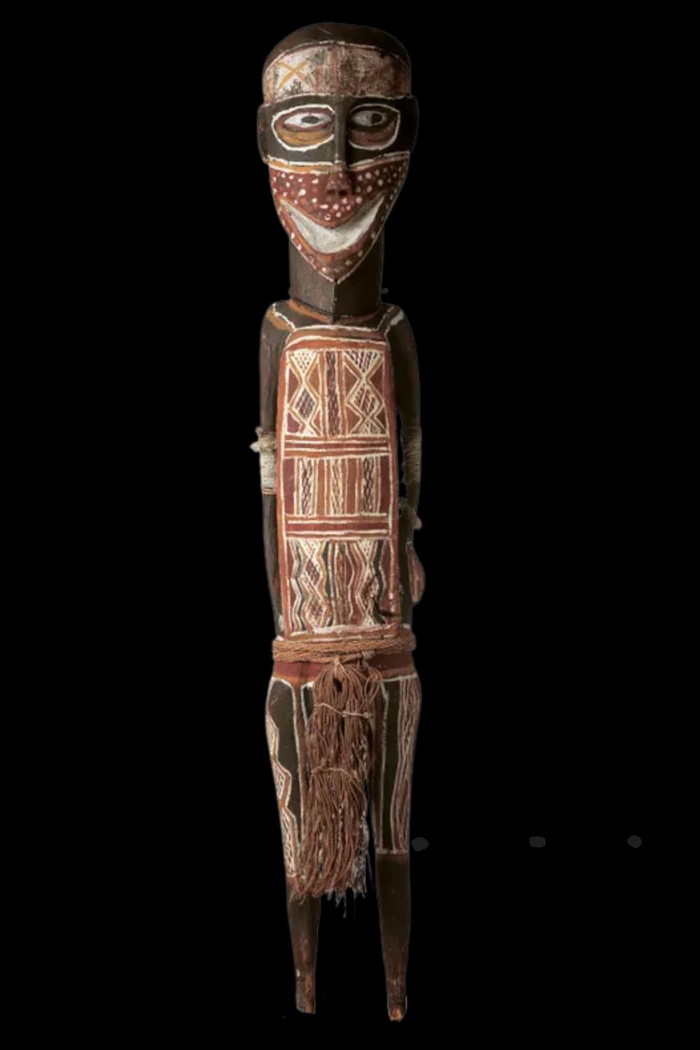 Painted Yolŋu sculpture by Birrikitji Gumana covered with geometric miny'tji clan designs