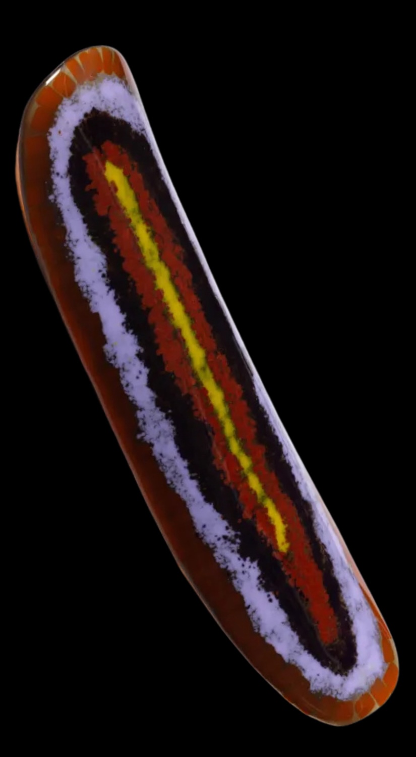 Luwantja glass coolamon by Balgo artist Bai Bai Napangarti, featuring red, yellow, black and white designs, presented during Australia's 2008 National Apology.