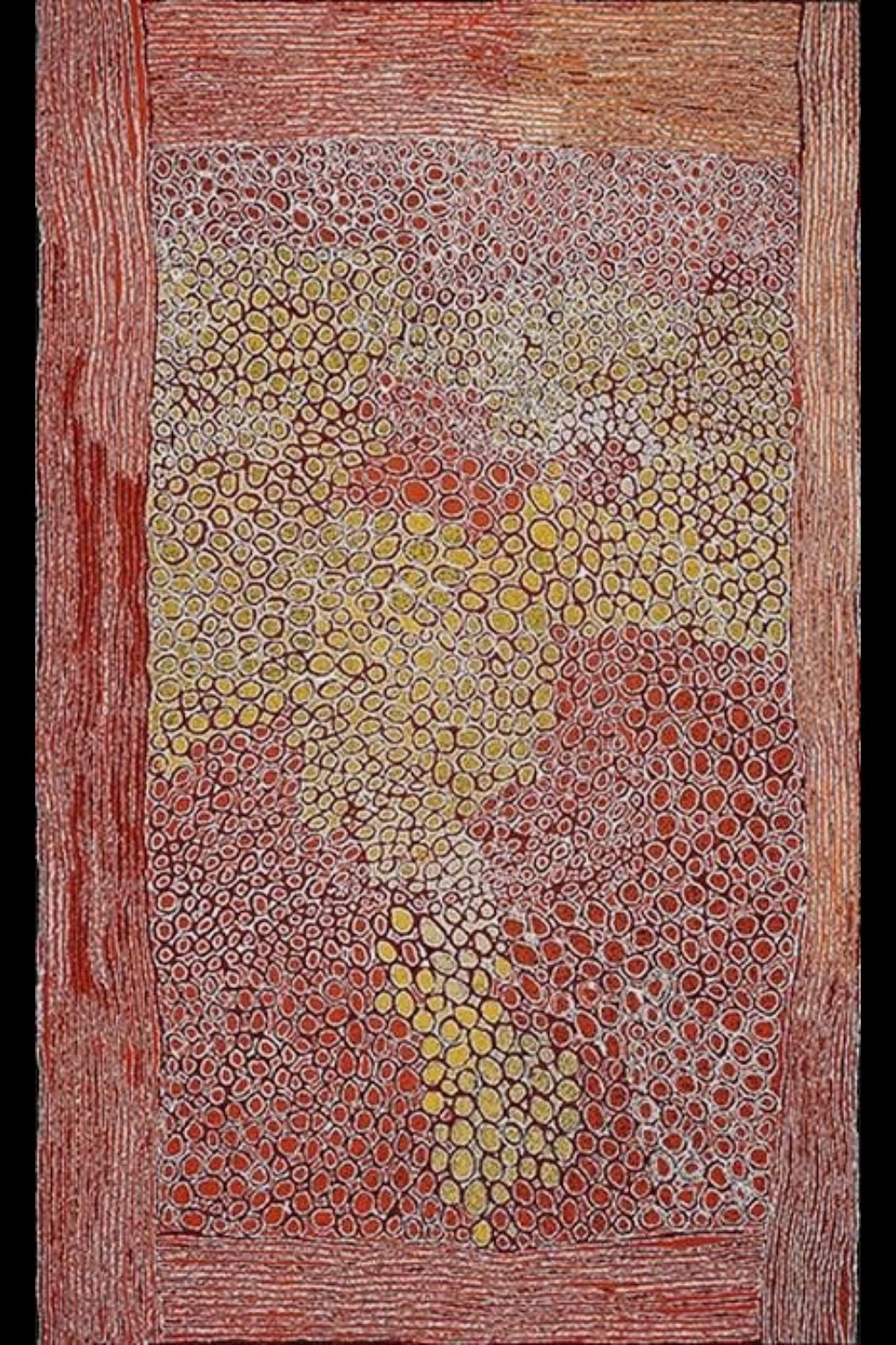 Kutungka Napanangka at Papunga (2005) by Walangkura Napanangka, featuring densely packed red and yellow circular forms representing rockholes and sandhills.