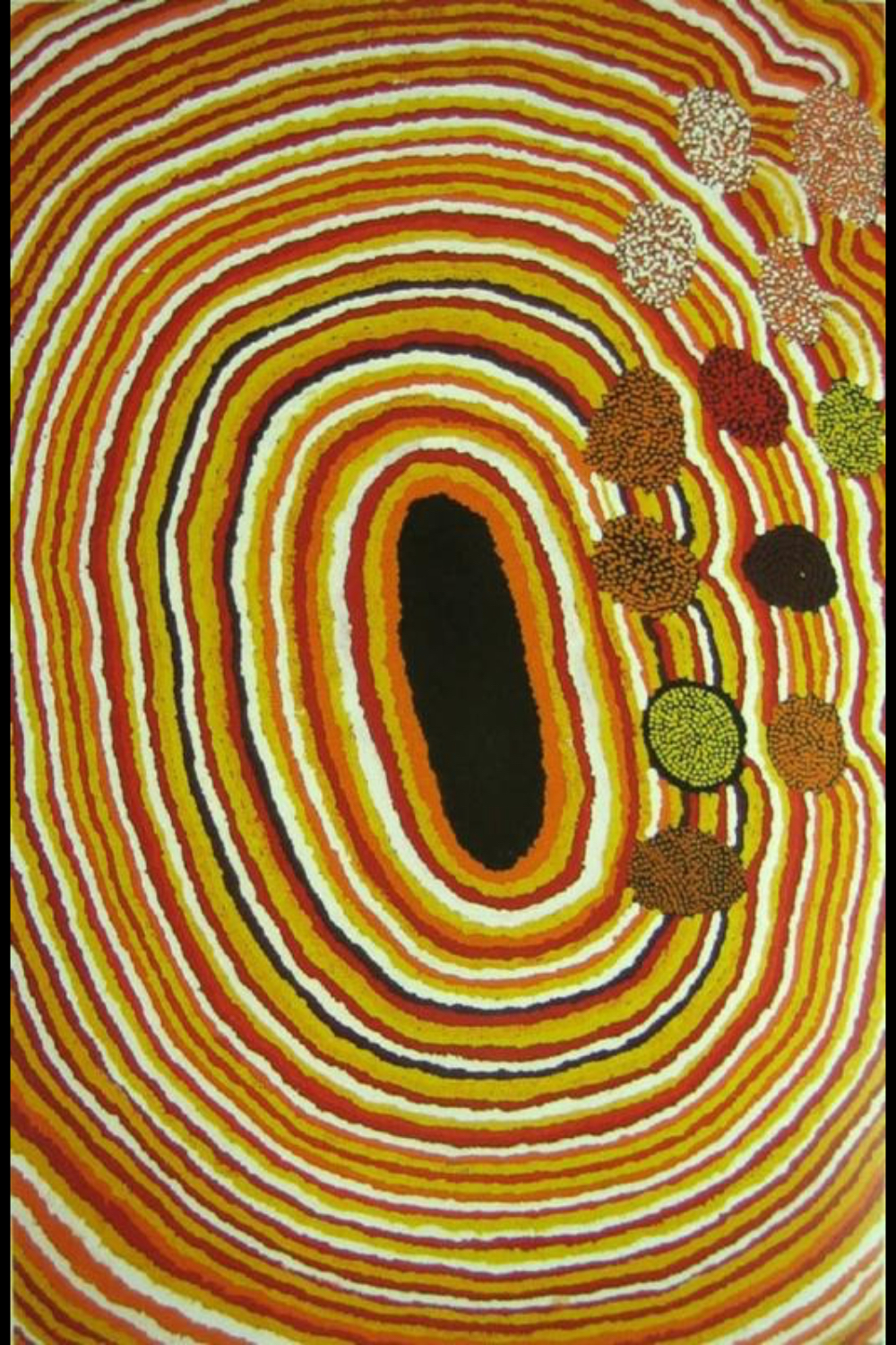 Bai Bai Napangarti's Marnawee (2003), a Balgo Aboriginal painting featuring a central black oval surrounded by concentric bands of red, yellow and white.