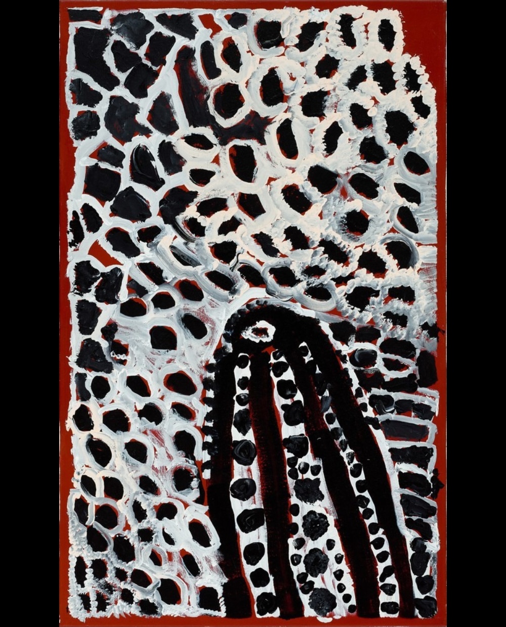 Harry Tjutjuna's Mututa Tjurkurpa (2010), depicting the ancestral Bilby Woman in black, white and deep red, surrounded by densely packed circular patterns.