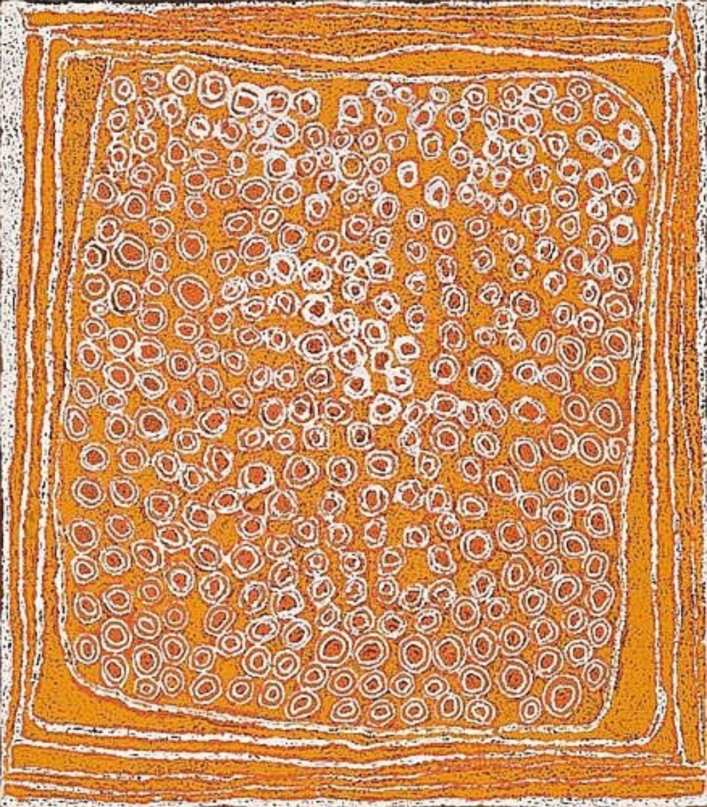 Wirrulnga (1999) by Walangkura Napanangka, featuring hundreds of white concentric circles on an ochre-orange background representing ancestral women's Country near Kiwirrkura.